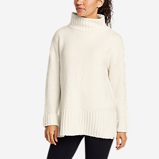 white funnel neck sweater